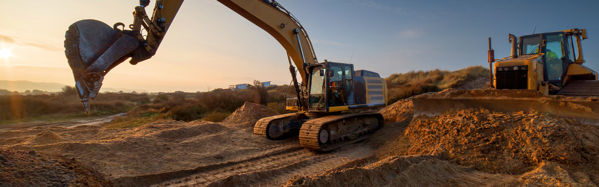 excavator in a dirt area